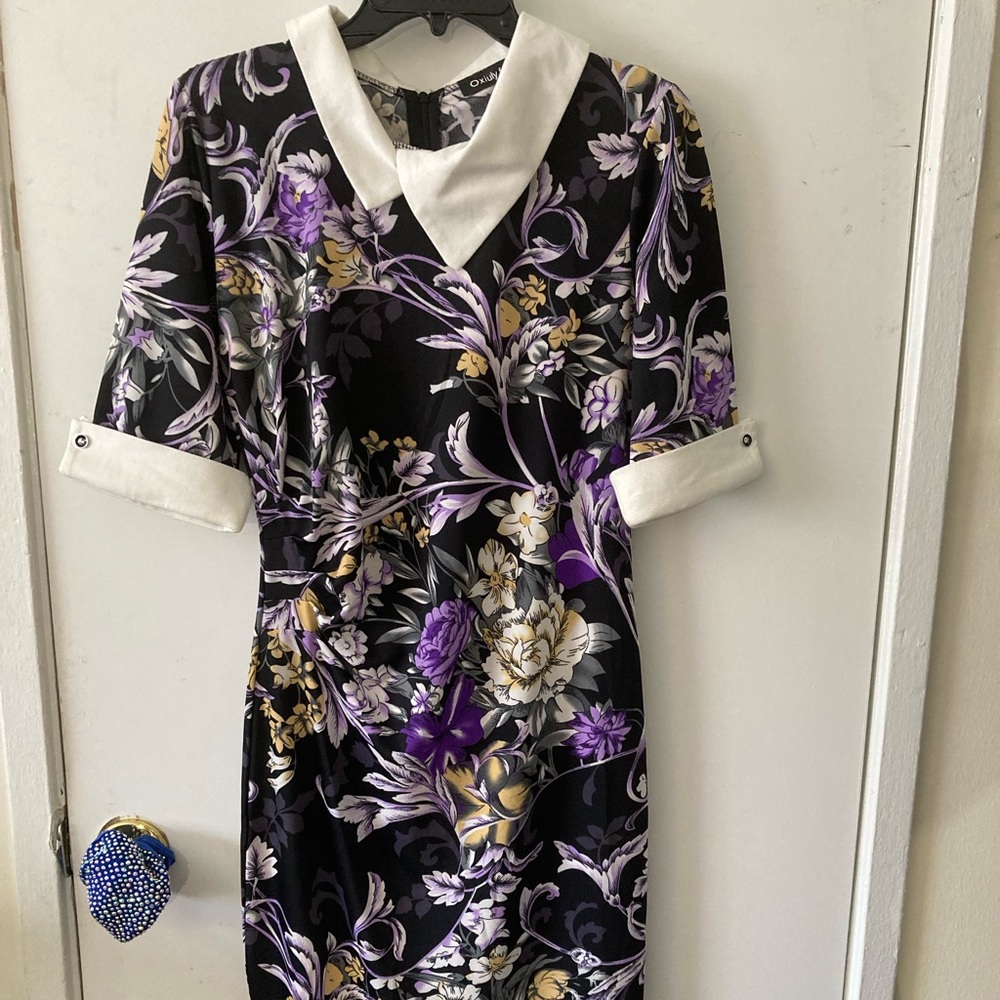 Mid length dress, multi colored, size medium.